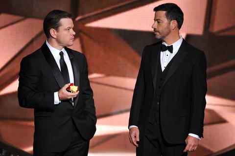 Matt Damon and host Jimmy Kimmel on stage at the 2016 Primetime Emmys.