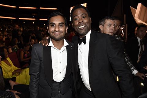 Aziz Ansari and Chris Rock pose in the audience at the 2016 Primetime Emmys.