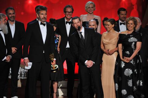 The cast and crew for Game of Thrones accept their award at the 2016 Primetime Emmys.