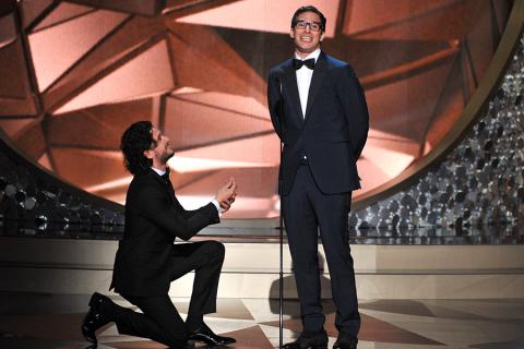 Kit Harington and Andy Samberg on stage at the 2016 Primetime Emmys. 