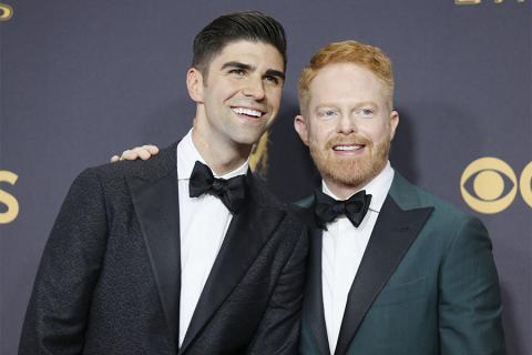 Justin Mikita and Jesse Tyler Ferguson on the red carpet at the 69th Primetime Emmy Awards
