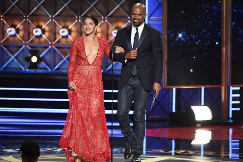 Gina Rodriguez and Shemar Moore on stage at the 2017 Primetime Emmys.