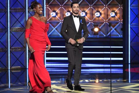 Issa Rae and Riz Ahmed on stage at the 2017 Primetime Emmys.