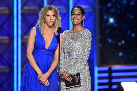 Kaitlin Olson and Tracee Ellis Ross on stage at the 2017 Primetime Emmys.