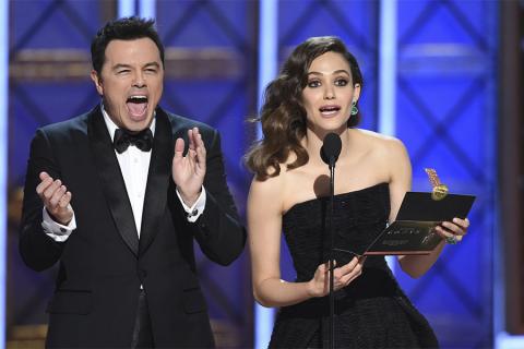 Seth MacFarlane and Emmy Rossum present an award at the 2017 Primetime Emmys.