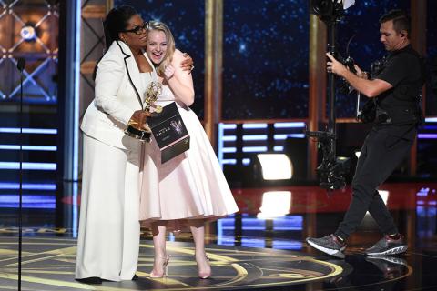 Elisabeth Moss accepts an award at the 2017 Primetime Emmys.