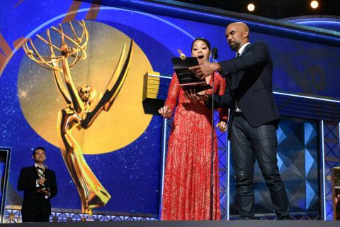 Shamar Moore and Gina Rodriguez present an award at the 69th Primetime Emmys.