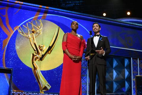 Issa Rae and Riz Ahmed present an award on stage at the 69th Primetime Emmys. 