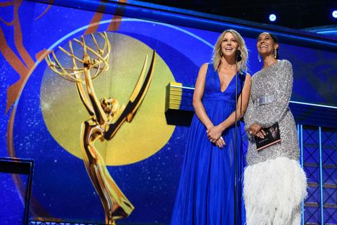 Kaitlin Olson and Tracee Ellis Ross on stage at the 69th Emmy Awards.