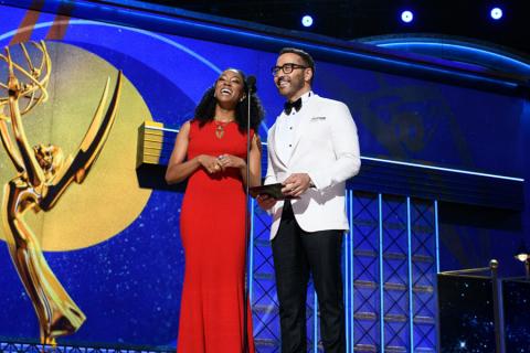 Sonequa Martin-Green and Jeremy Piven on stage at the 69th Emmy Awards.