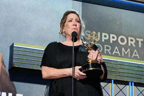 Ann Dowd accepts her award at the 69th Primetime Emmys