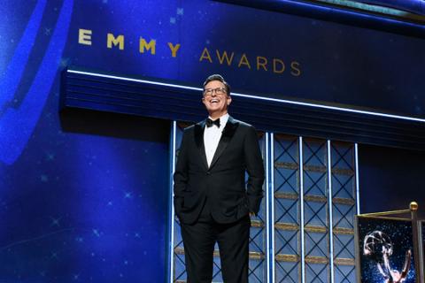 Stephen Colbert on stage at the 69th Emmy Awards.