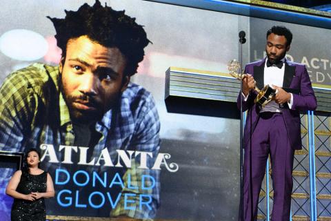 Donald Glover accepts an award at the 69th Emmy Awards.