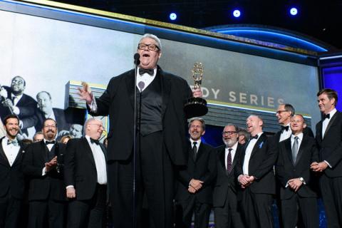 The Veep team accepts their award at the 69th Emmy Awards.
