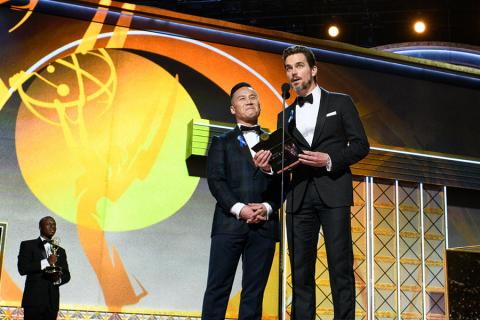 BD Wong and Matt Bomer on stage at the 69th Emmy Awards.