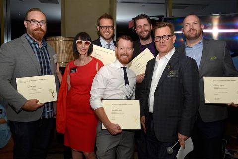 Television Academy governors Lynda Kahn and Eric Anderson present certificates to the Cosmos team at the Motion and Title Design Nominee Reception in West Hollywood, California.
