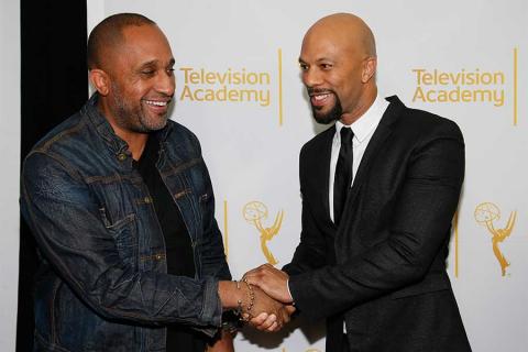 Kenya Barris greets Common on the red carpet at An Evening with Norman Lear at the Montalban Theater in Hollywood.