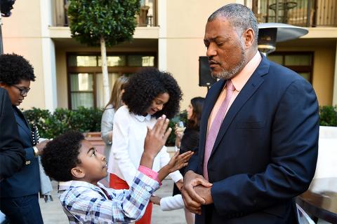 Miles Brown and Laurence Fishburne of black-ish enjoy the reception at the Eighth Annual Television Academy Honors, May 27 at the Montage Beverly Hills.