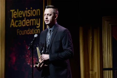 Nate Fenwick-Smith accepts an award at the 36th College Television Awards at the Skirball Cultural Center in Los Angeles, California, April 23, 2015.