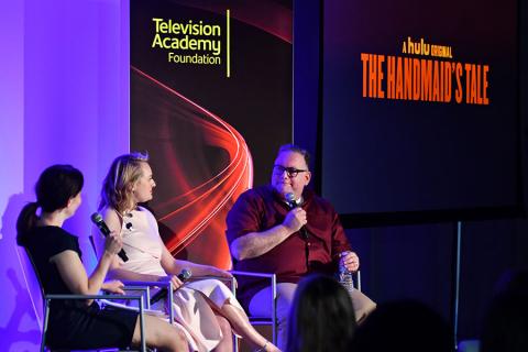 Beatrice Springborn, Elisabeth Moss, and Bruce Miller at The Handmaid's Tale: From Script to Screen at the Wolf Theatre at the Saban Media Center in North Hollywood, California.
