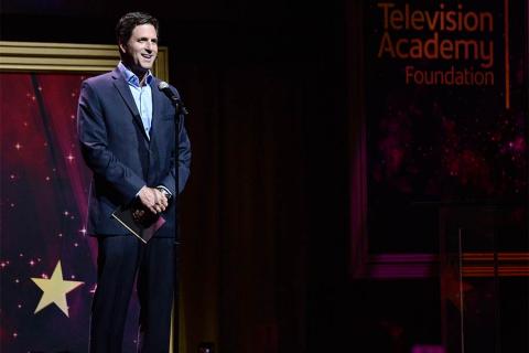 Steve Levitan presents an award at the 36th College Television Awards at the Skirball Cultural Center in Los Angeles, California, April 23, 2015.